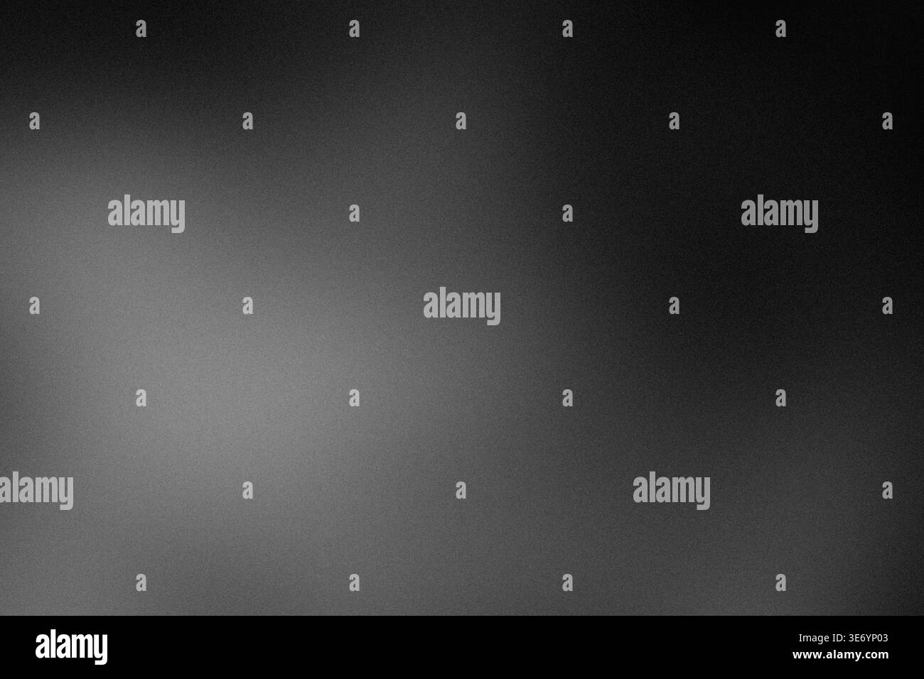 Grainy dark gradient background with soft light vignette and copy space Stock Photo
