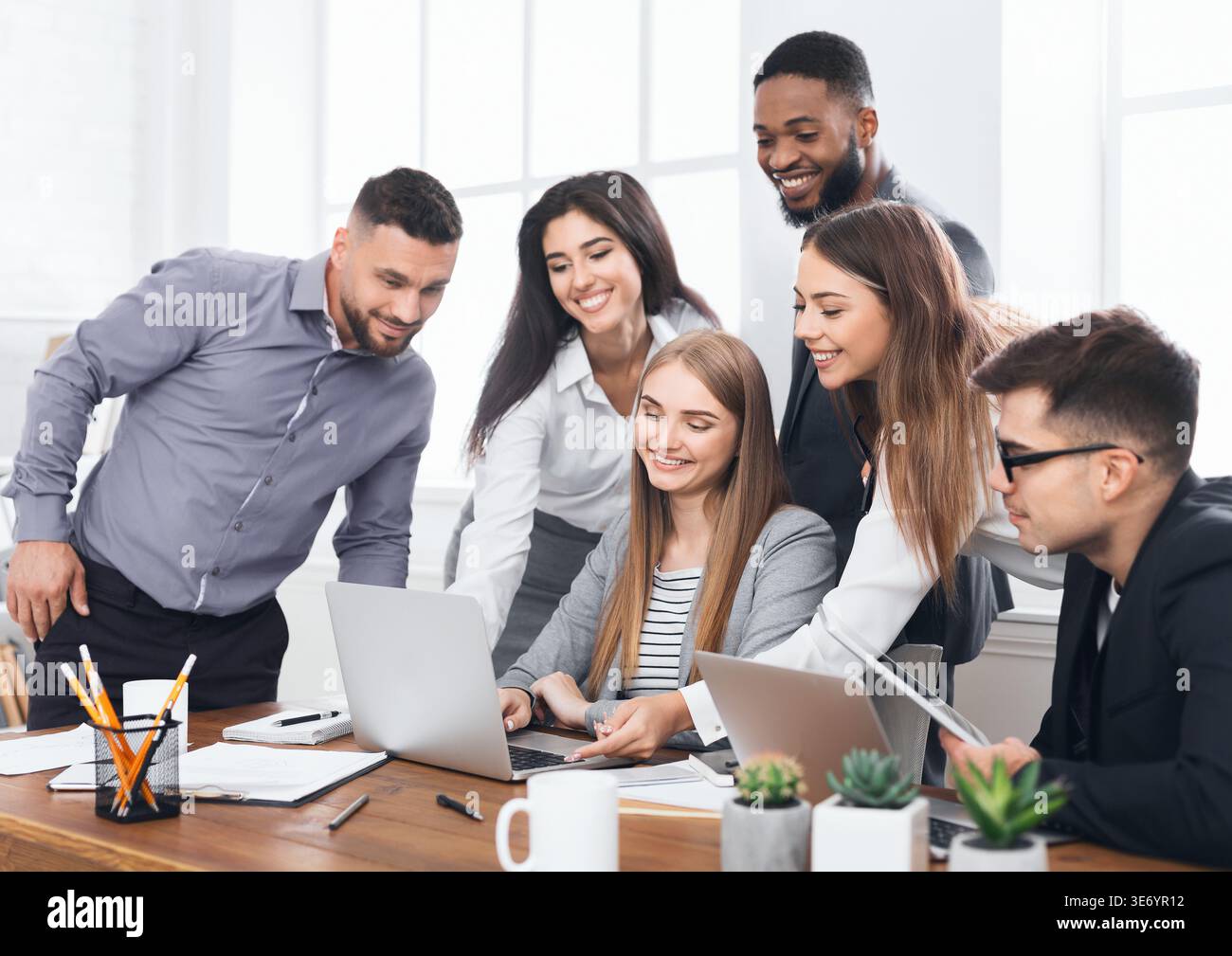 Young creative managers team working with new project Stock Photo