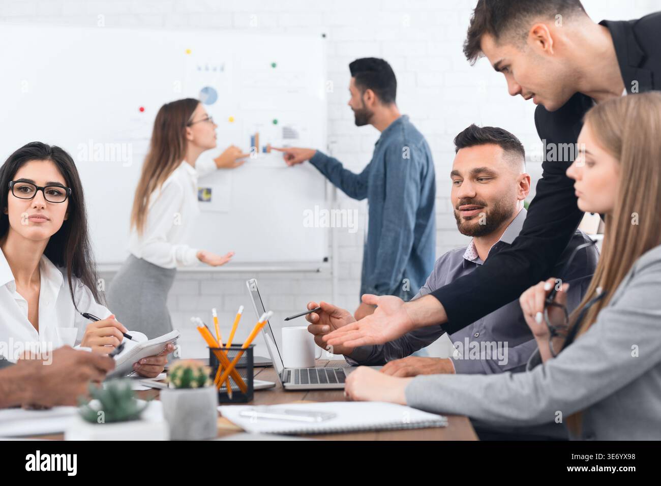 Group of business people analyzing data Stock Photo