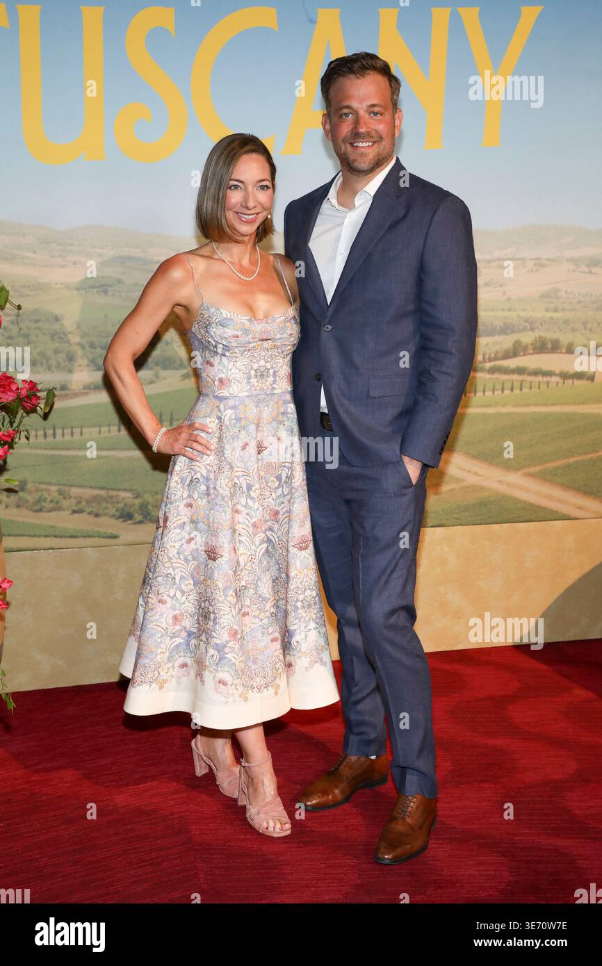 Kristin N. Engle, left, and Ryan Engle attend the premiere of 