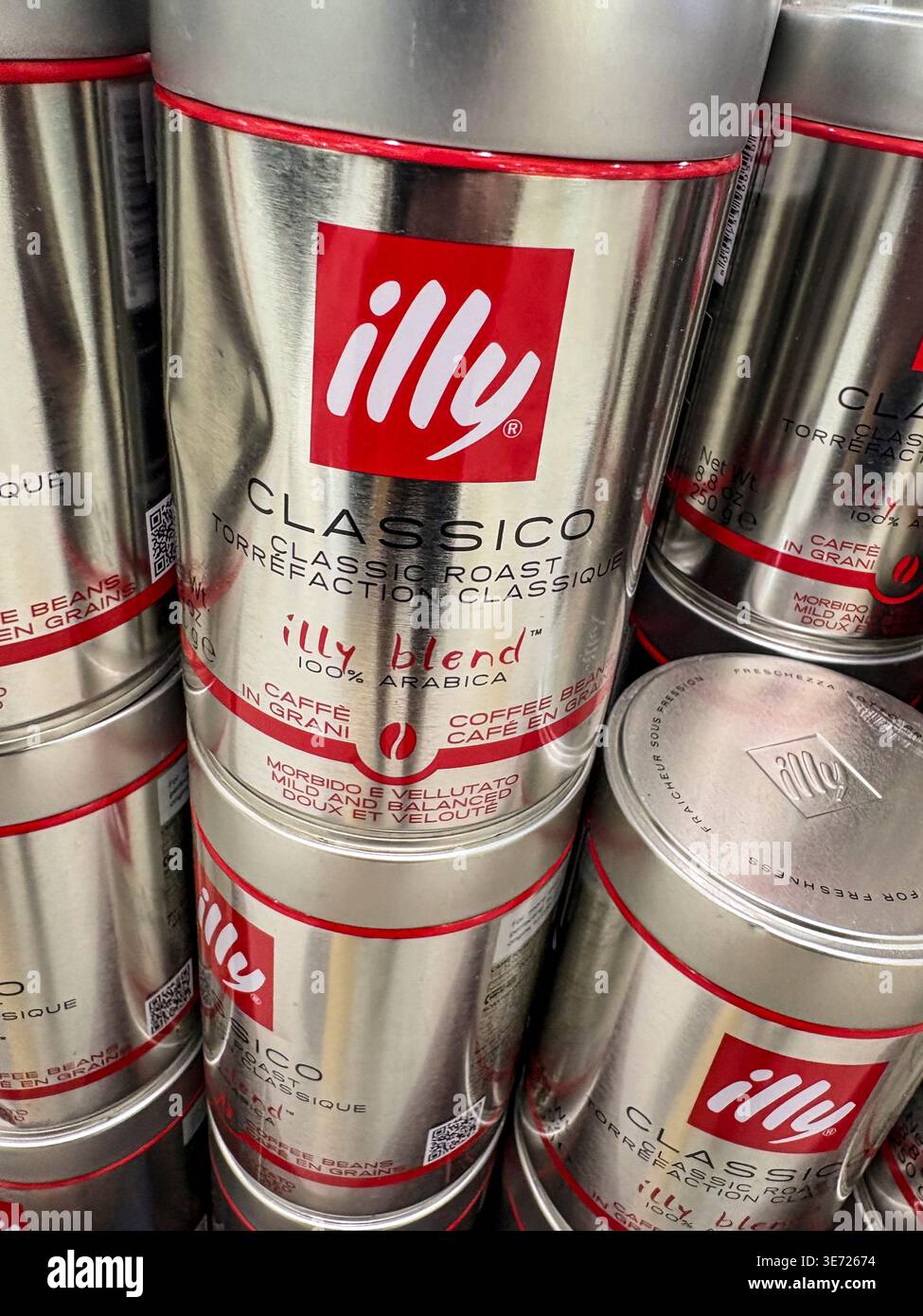 Illy coffee beans, Illy classico 1200% arabica beans in silver jar tin for sale in a Sydney supermarket, Australia - Smartphone Captured Stock Image