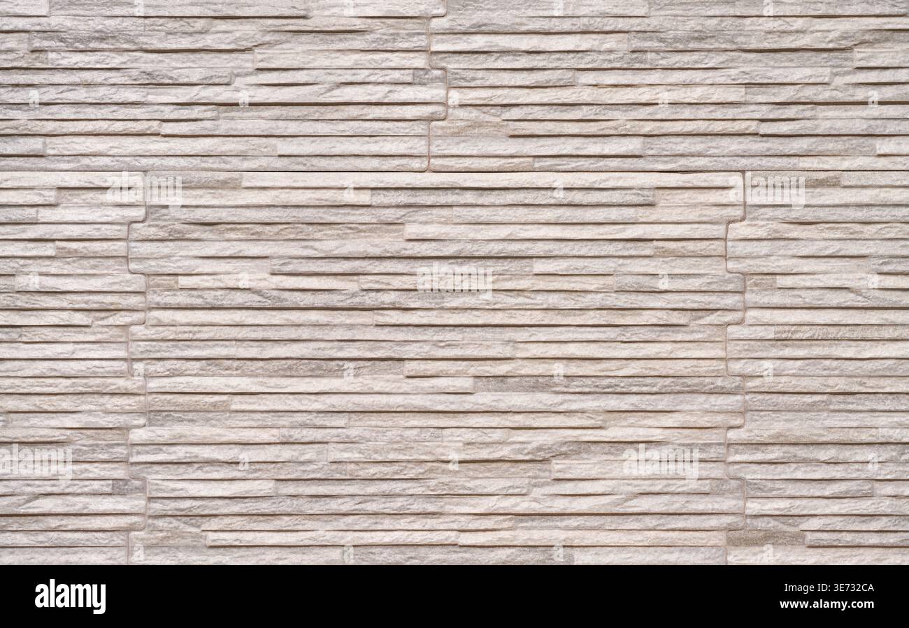 Bright facing with stone-effect on a facade Stock Photo