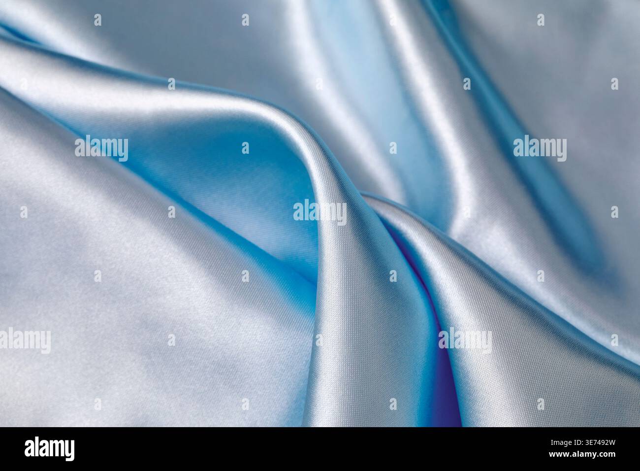 Close-up of folded light blue silk Stock Photo