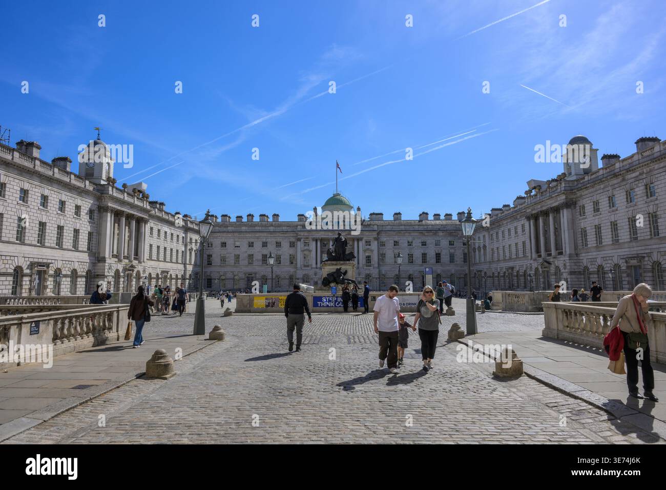 Courtyard of Somerset House in London featuring neoclassical architecture, open urban space, and a popular cultural landmark in the city centre. Stock Photo