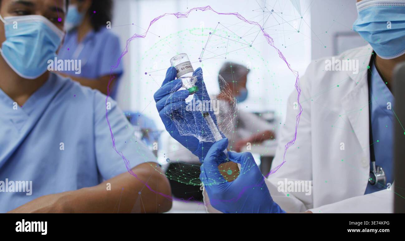 Loading Injection From Vial Drawing blue-gloved hands loading syringe from vaccine vial in clinic ...