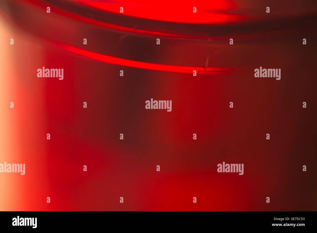 Deep red abstract background featuring a soft horizontal glass texture line Stock Photo
