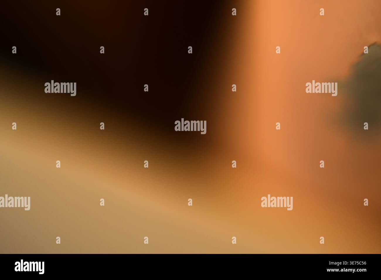 Warm tan abstract background with soft shadows and dark textural elements Stock Photo
