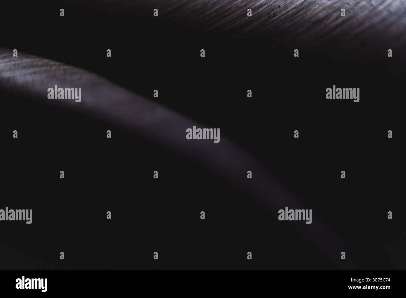 Deep black minimalist texture background with subtle metallic highlights Stock Photo
