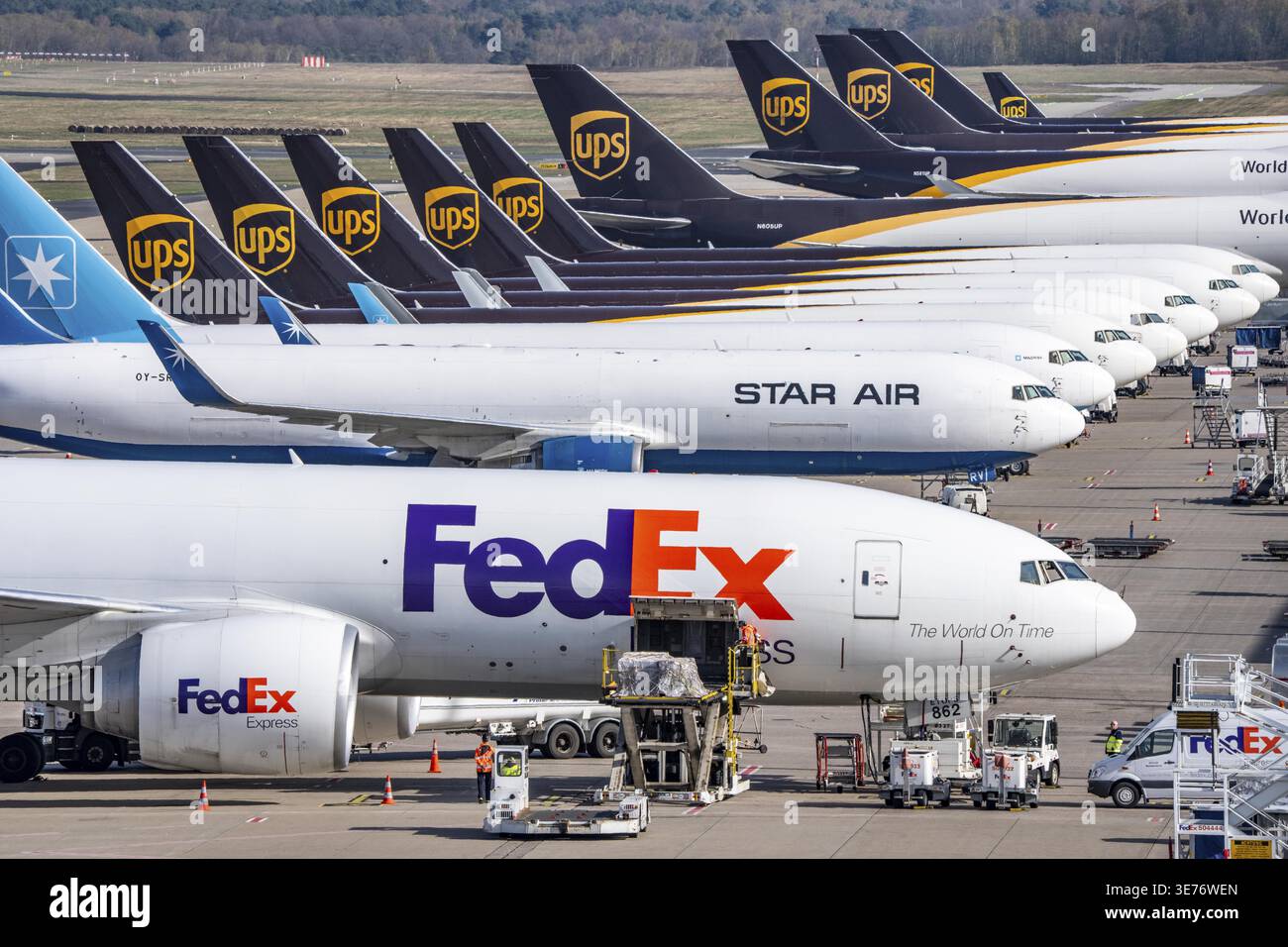 FedEx Express Boeing 777-FS2 cargo plane is unloaded, air freight