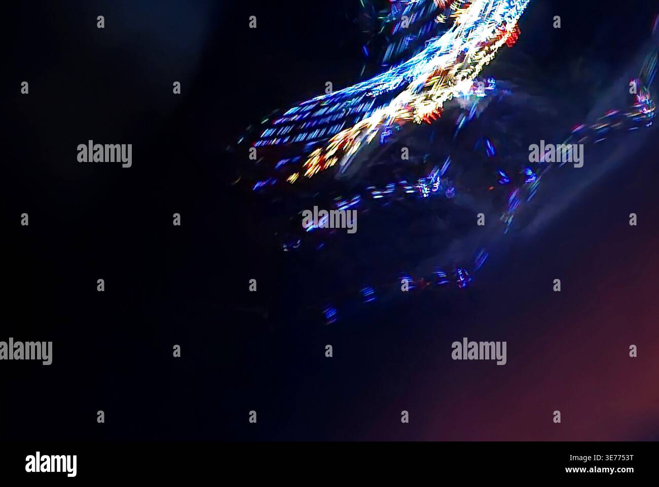 Abstract patterns from reflection of colored lights in motion. Stock Photo