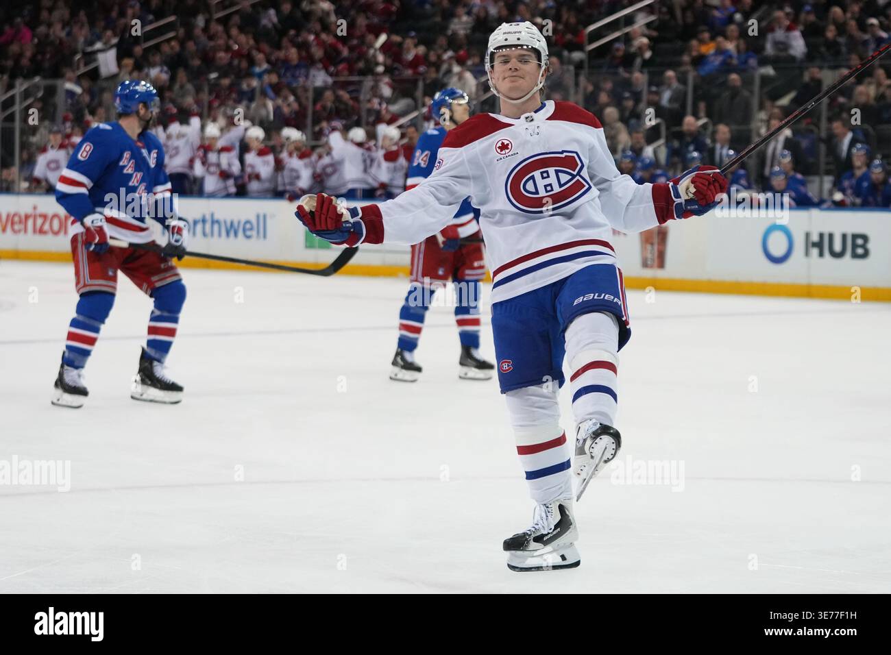 Montréal Canadiens' Cole Caufield (13) gestures after scoring a goal ...