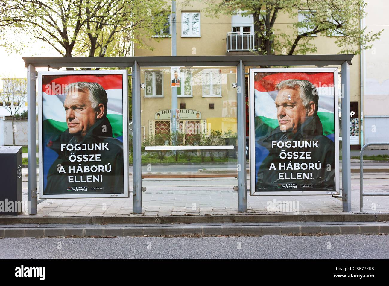 Fidesz government propaganda poster with Viktor Orban and "Let's unite against war" written on it in Hungarian on the street of Budapest, Hungary Stock Photo