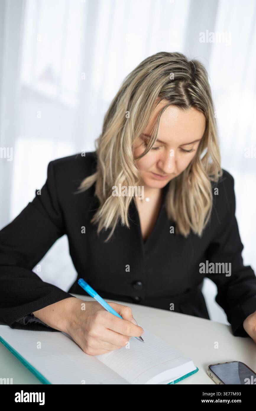 Professional woman in black blazer hi-res stock photography and images ...