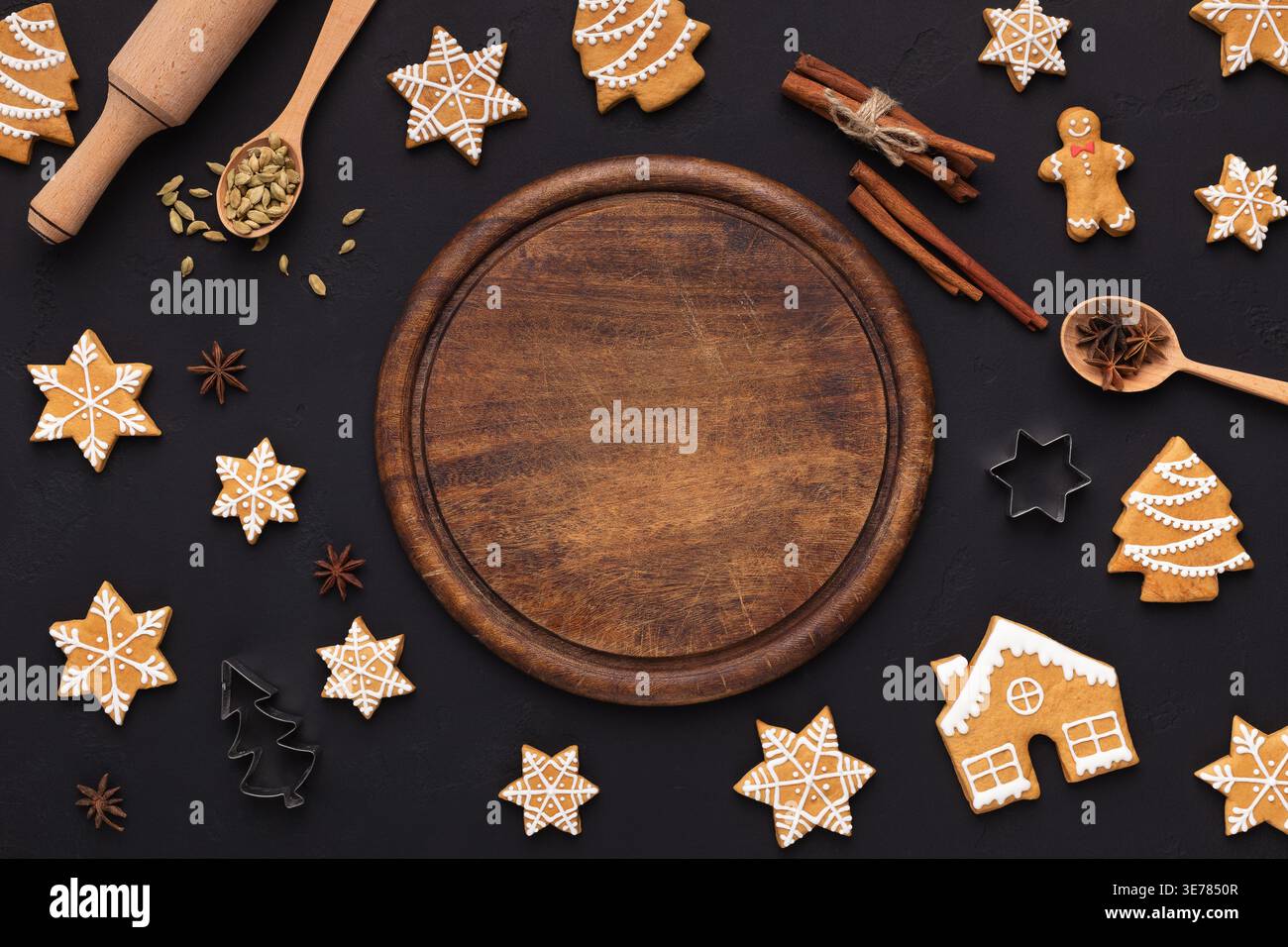 Christmas background with assorted cookies and wooden board Stock Photo