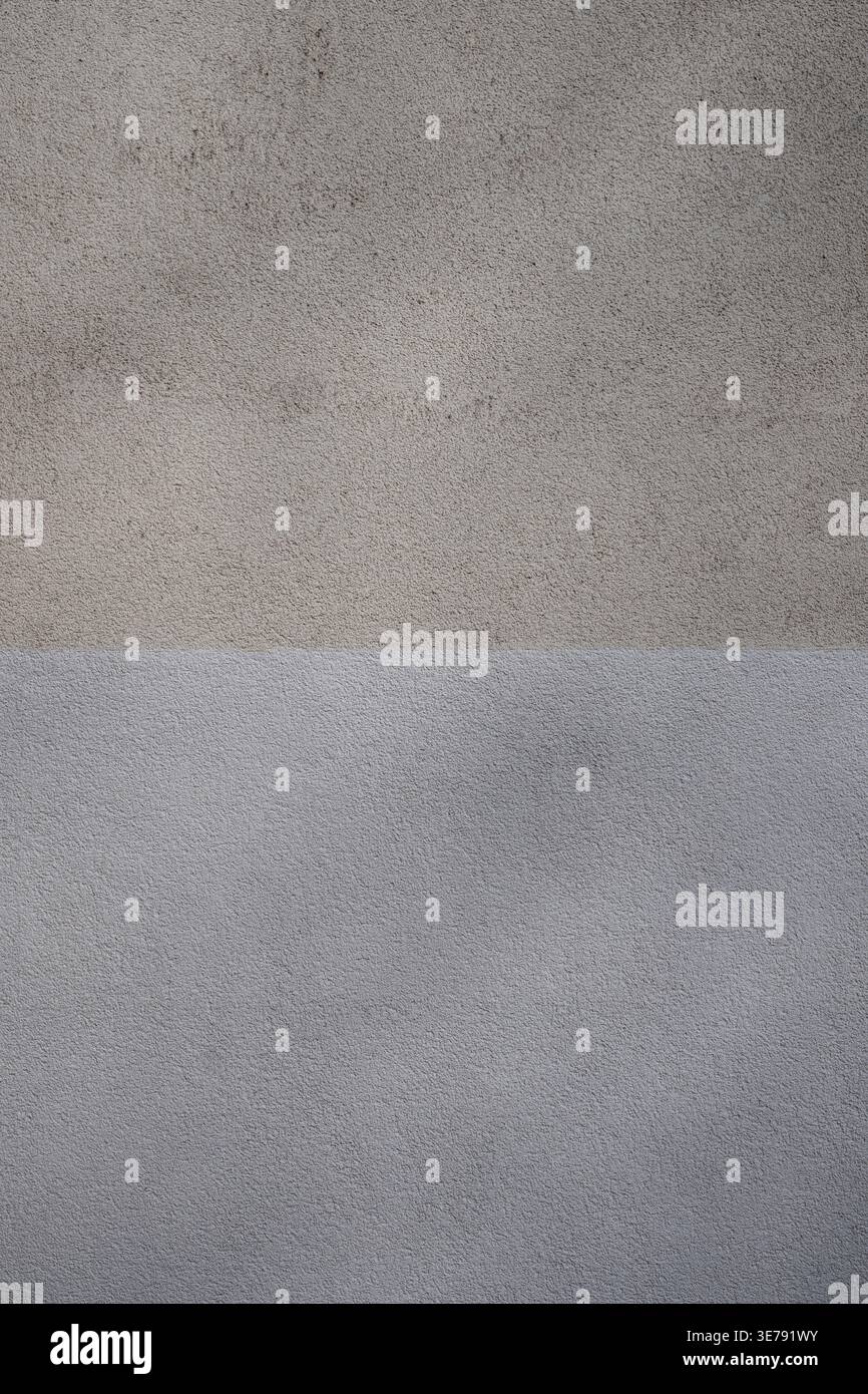 Subtle white and grey painted textured wall Stock Photo