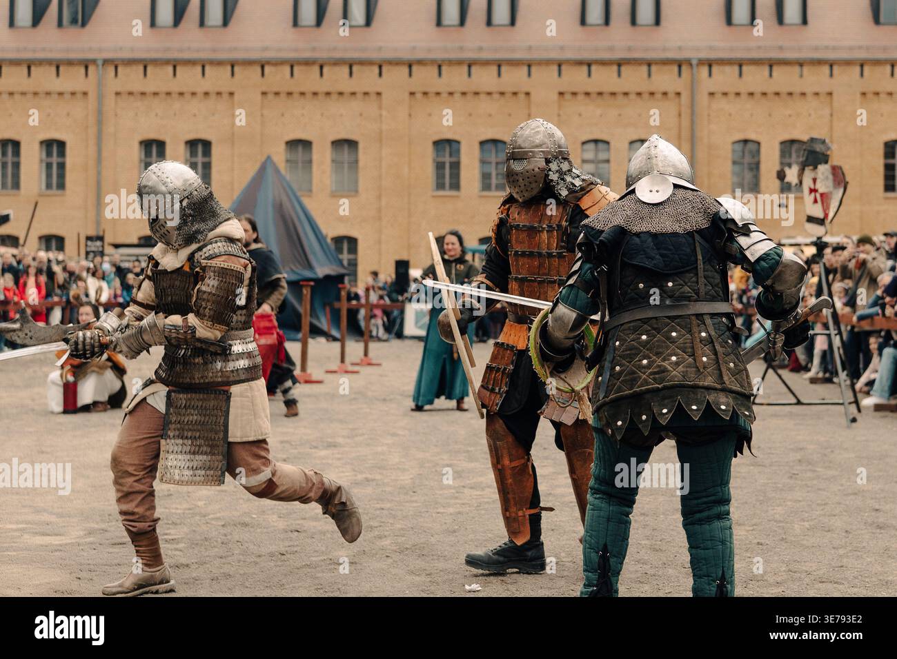 Berlin, Germany - April 5, 2026: armored medieval reenactors reposition ...