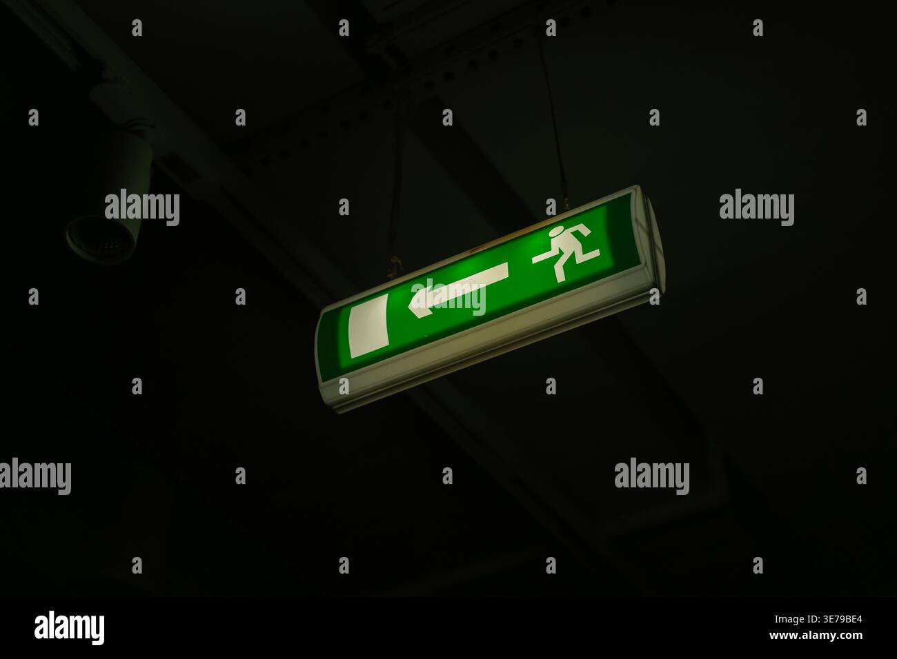 Exit sign on the ceiling Stock Photo