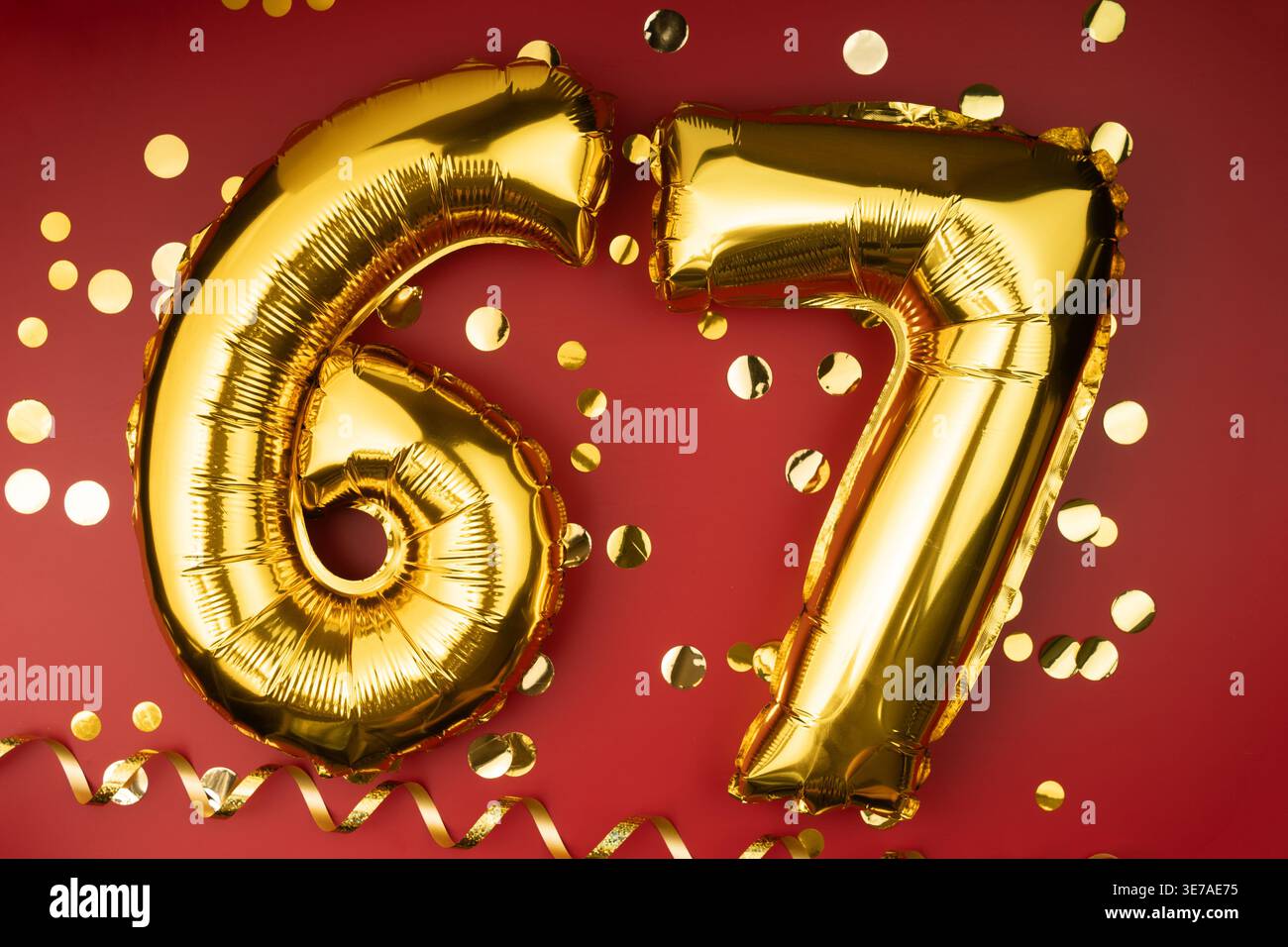67th birthday celebration. Gold festive balloons number 67 year ...