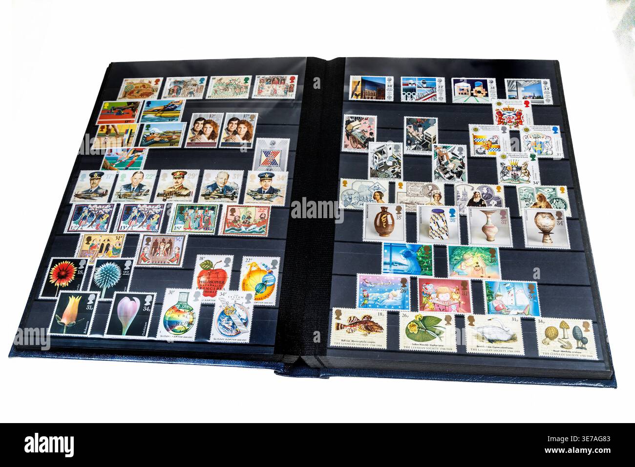 British pictorial postage stamps in stock album Stock Photo
