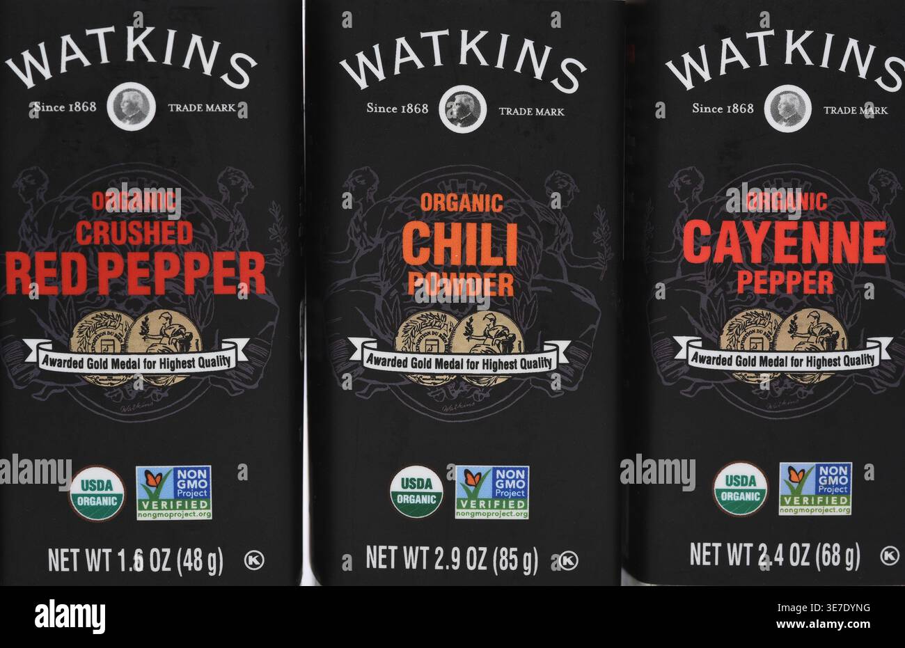 IRVINE, CALIFORNIA - 10 APR 2026: Closeup of the labels of three bottles of Watkins Spices, Crushed Red Pepper, Chili Powder and Cayenne  Pepper. Stock Photo