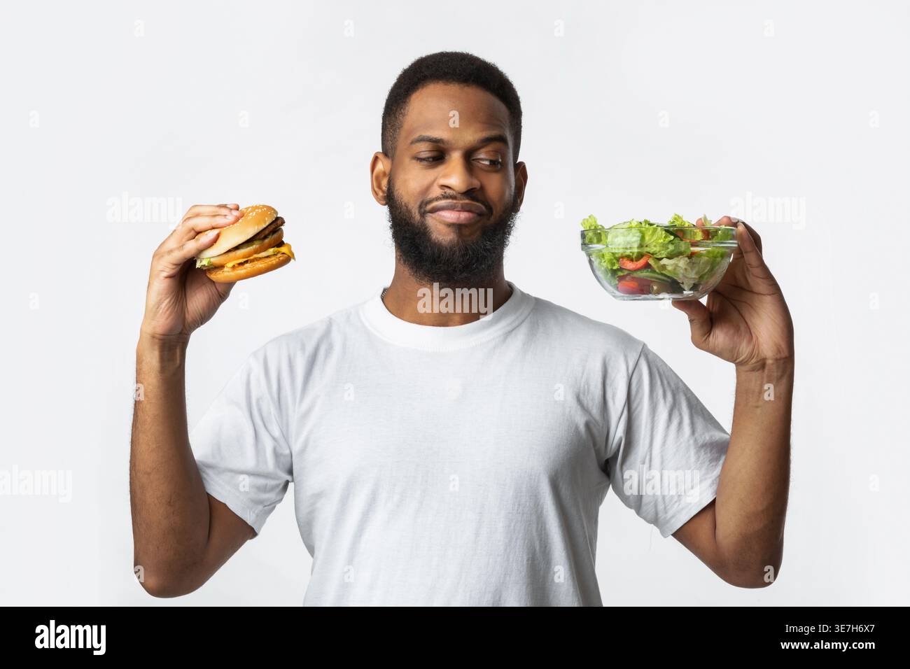 Healthy vs unhealthy hungry hi-res stock photography and images - Alamy