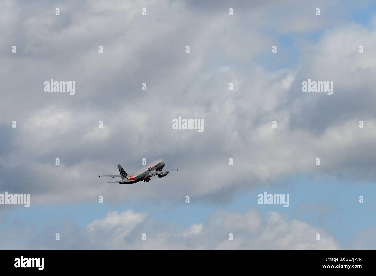 A Jetstar plane is seen after taking off at Melbourne Domestic and ...