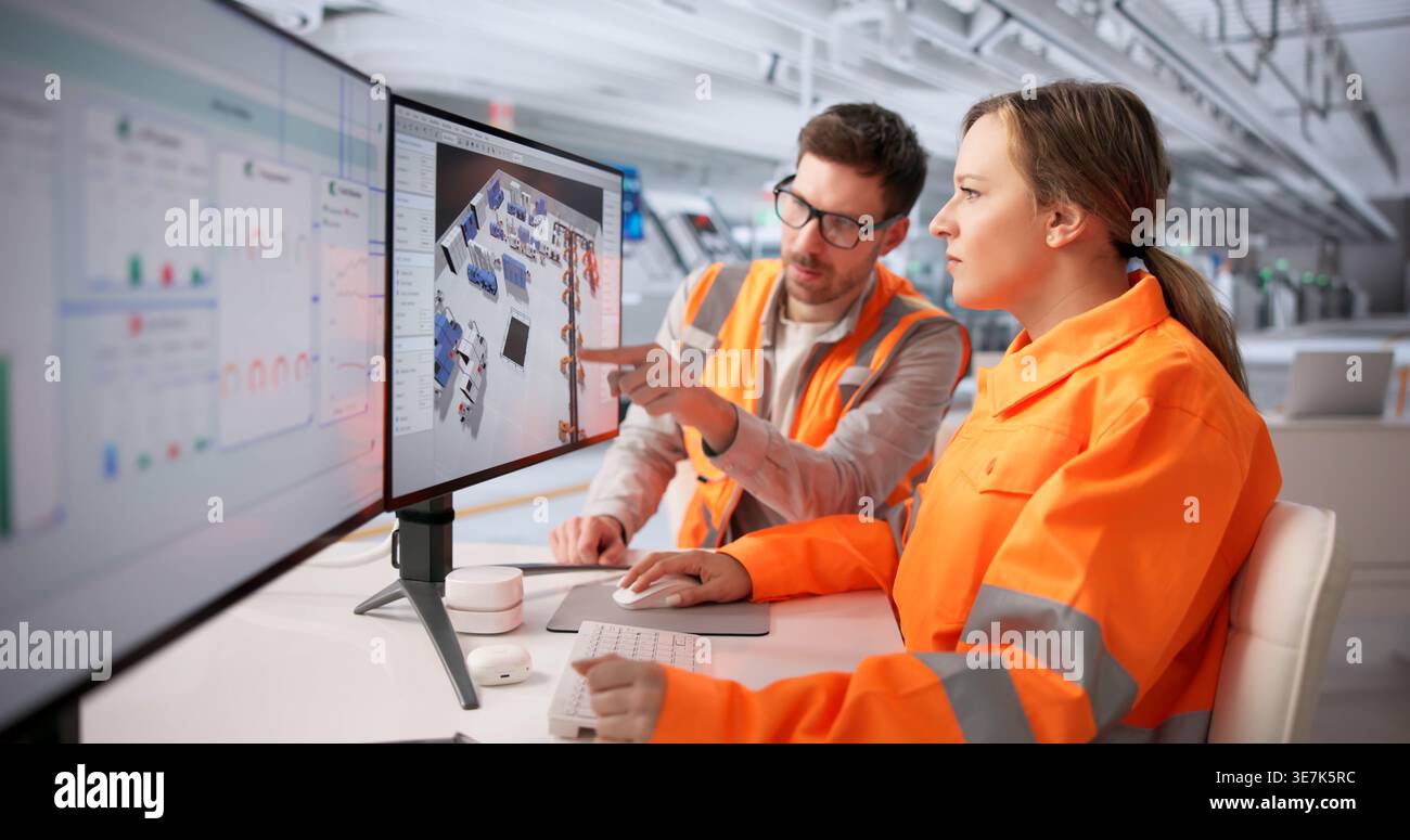 Engineers Collaborate On 3D CAD Factory Layout Optimization Using Advanced Software Stock Photo