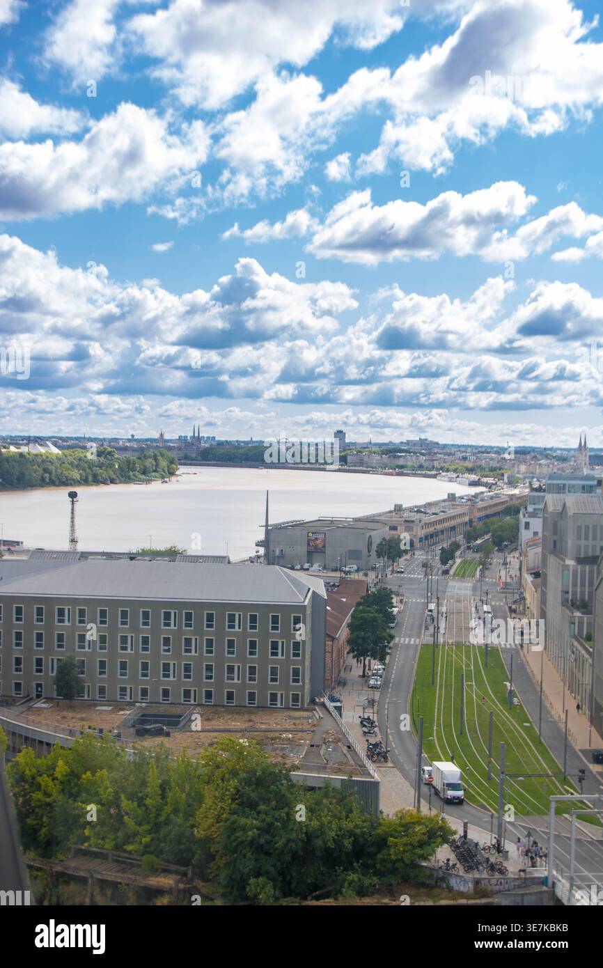 At Bordeaux, France , On 08,30,25, Panoramic aerial view of Bordeaux city skyline and the Garonne River from the Cité du Vin terrace, France Stock Photo