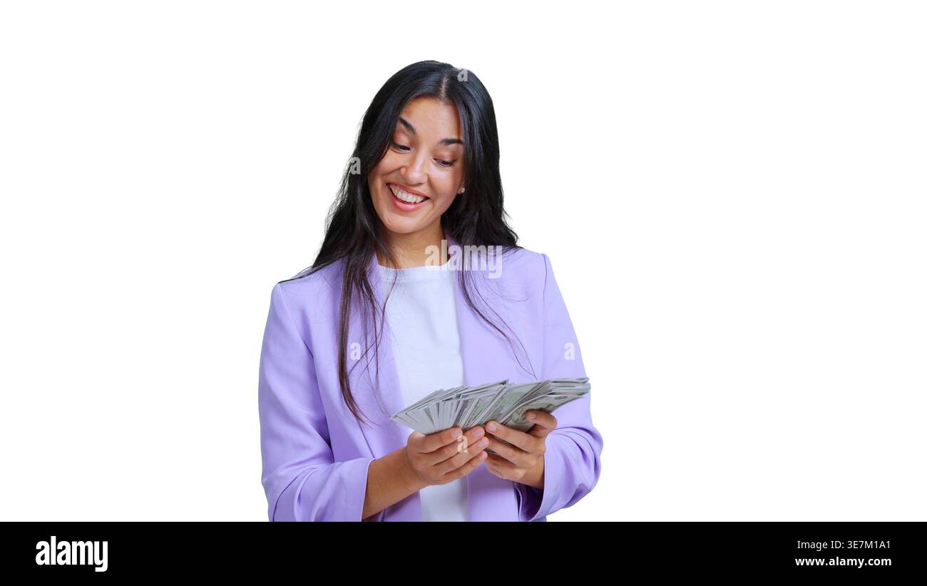 Happy woman holding money banknotes celebrating financial success Stock Photo
