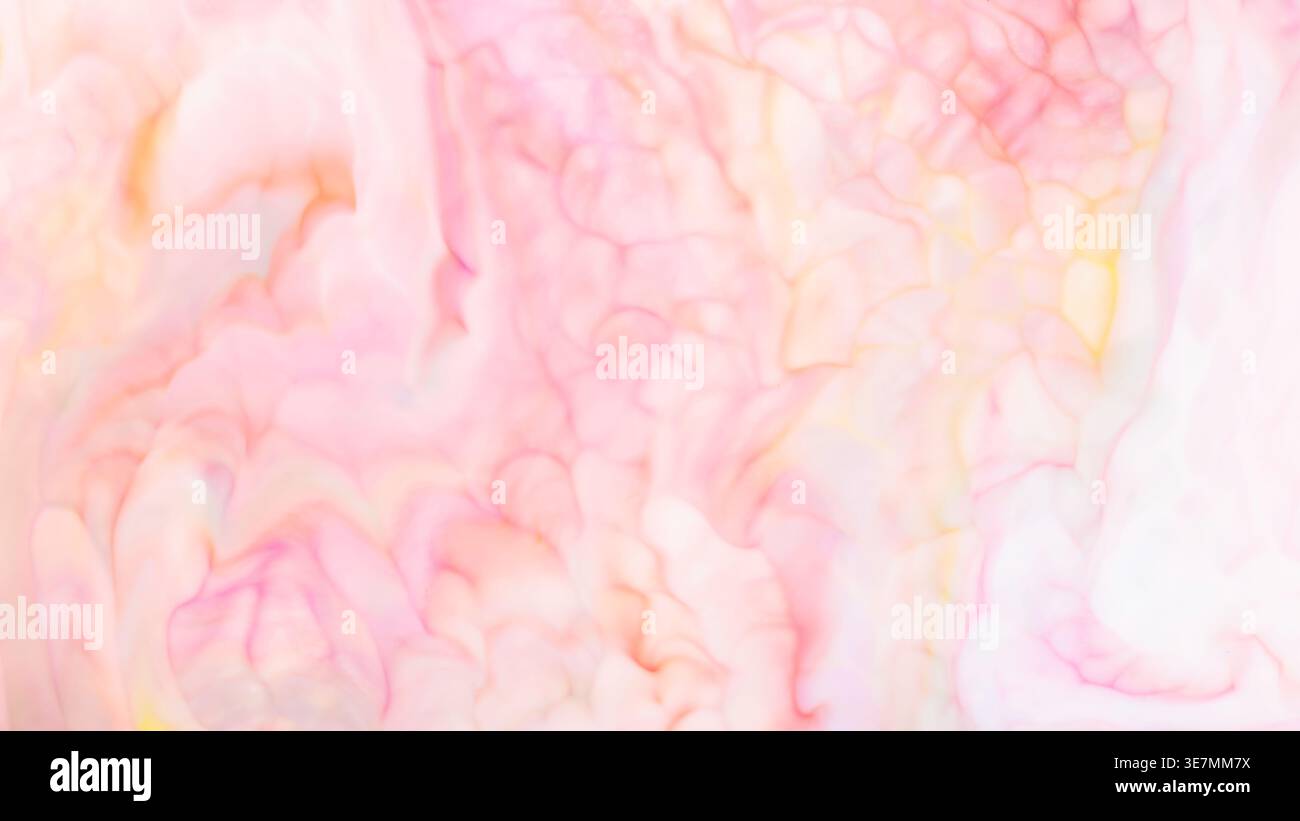 Soft pastel pink and peach marble texture background with flowing abstract pattern Stock Photo