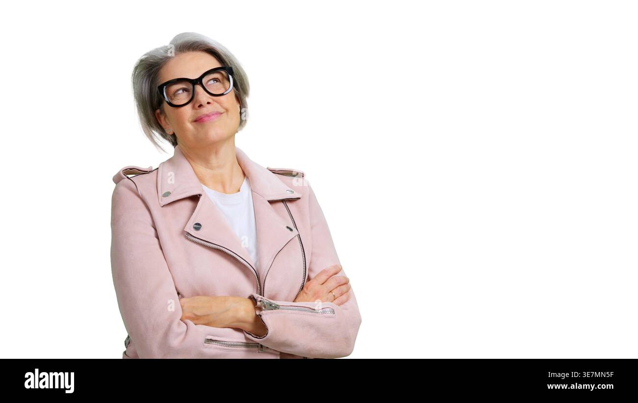 Mature woman wearing glasses looking up smiling cheerfully Stock Photo