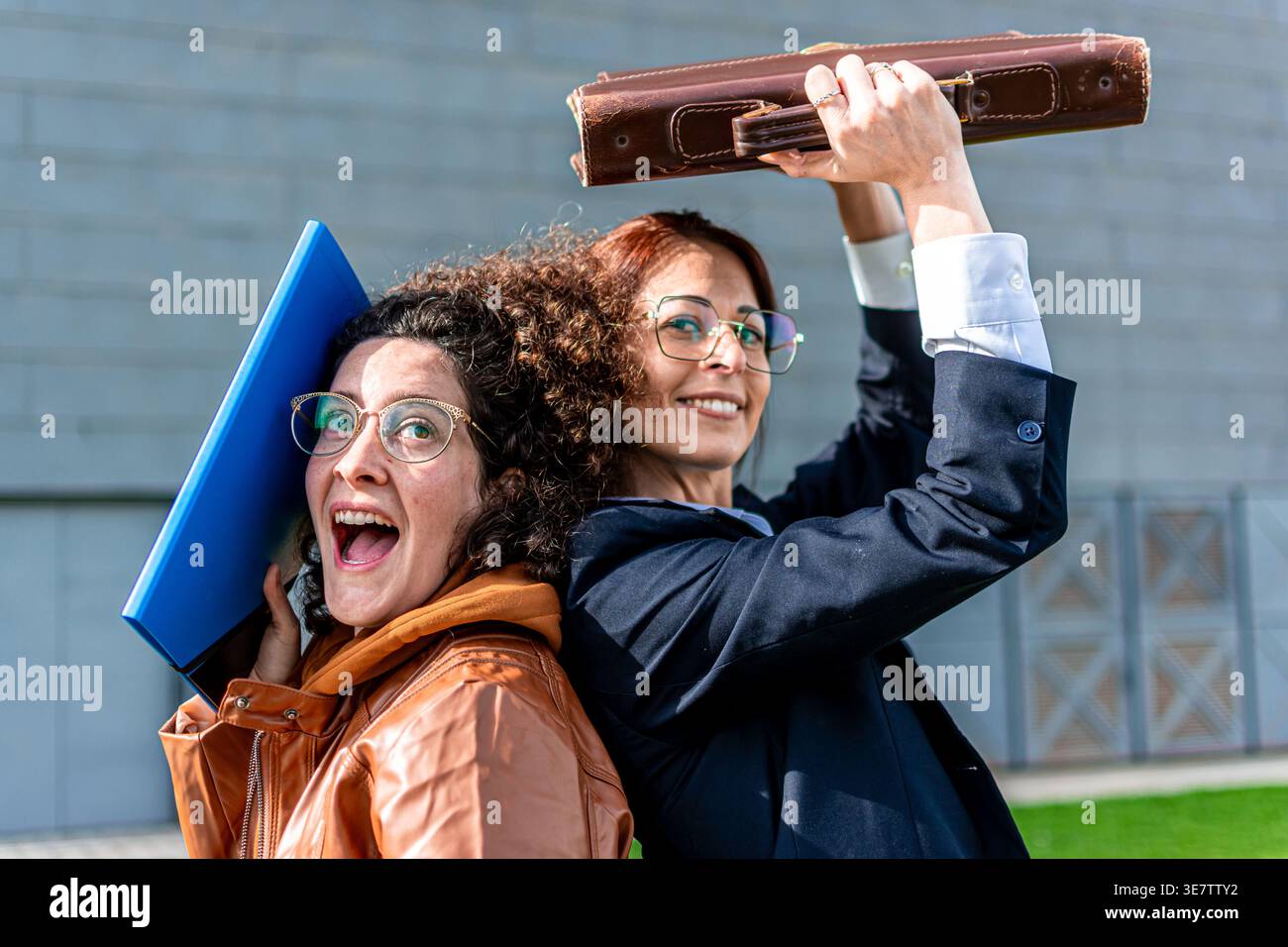 Successful businesswomen having fun together in office break Stock Photo
