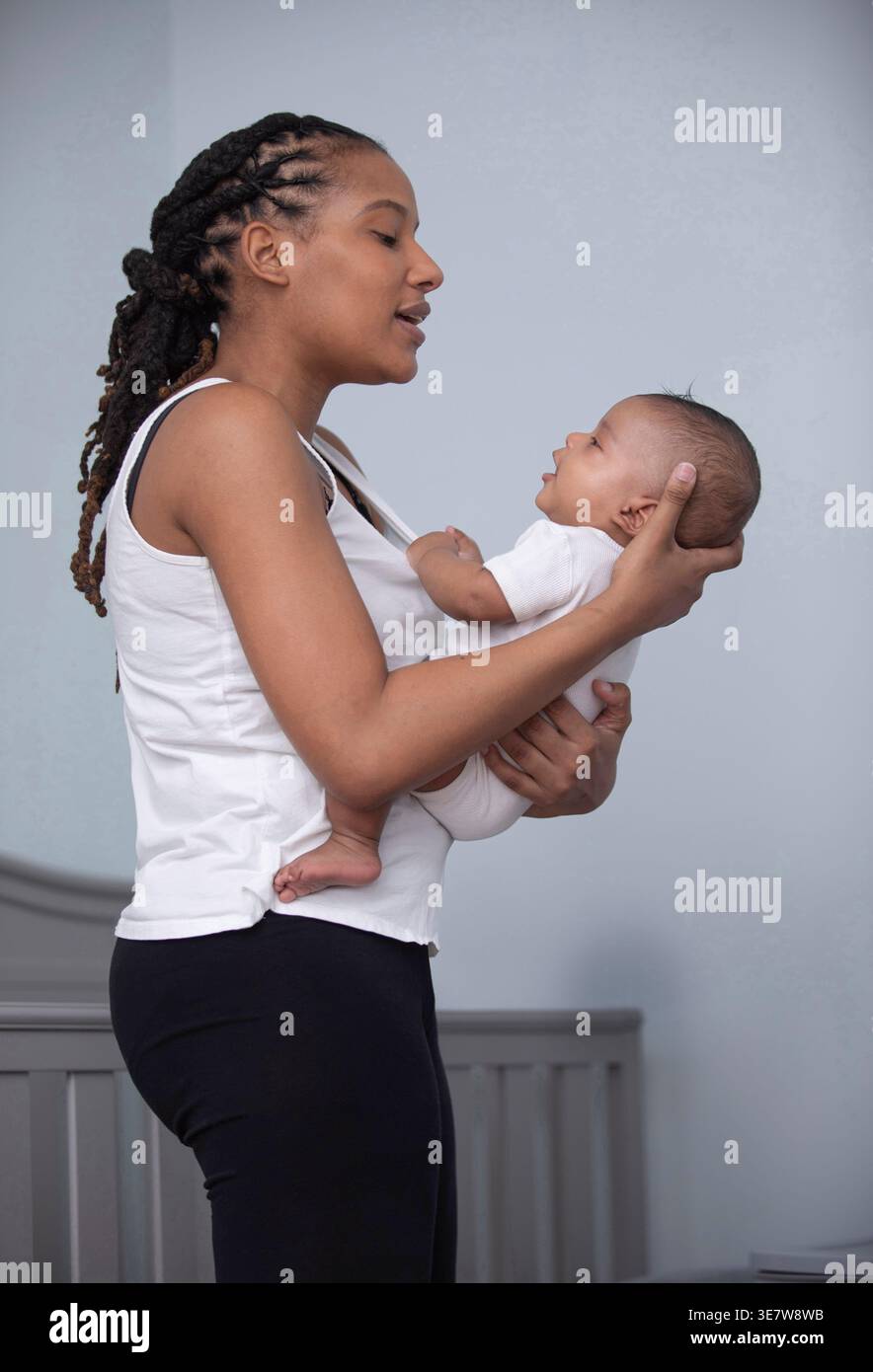 African woman holding newborn hi-res stock photography and images - Alamy