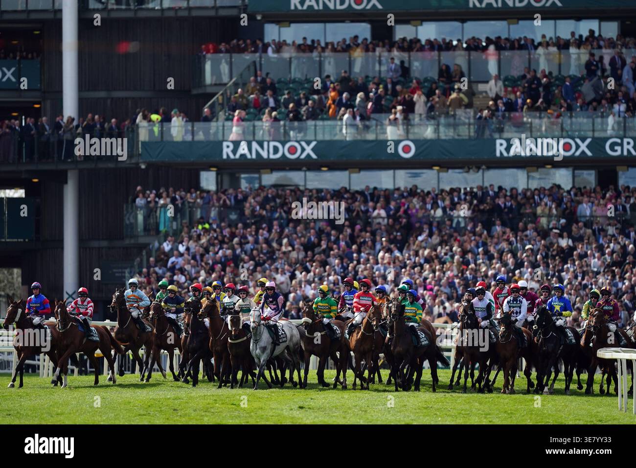 Randox Races Runners and riders on the start line before the Randox Grand National ...