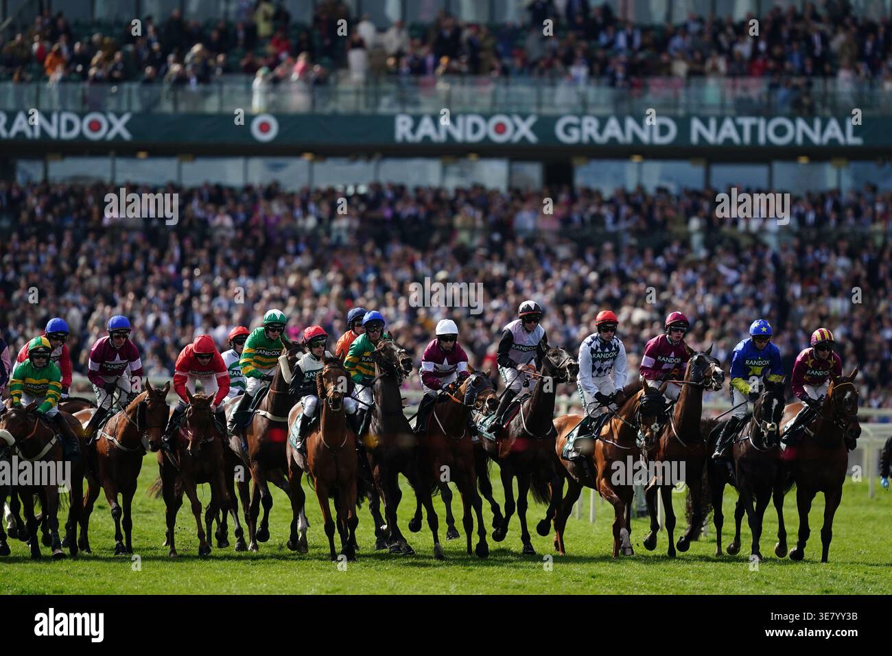 Randox Races Runners and riders on the start line before the Randox Grand National ...