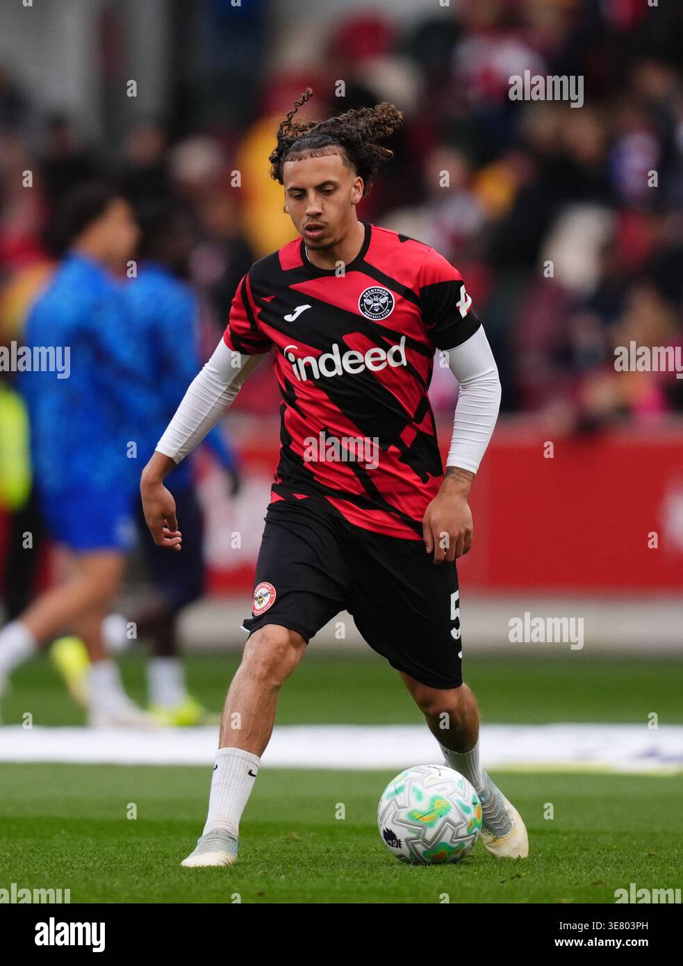 Brentford's Riley Owen warming up before the Premier League match at ...