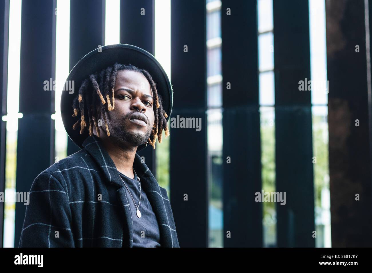 Black man african locks wearing hi-res stock photography and images - Alamy