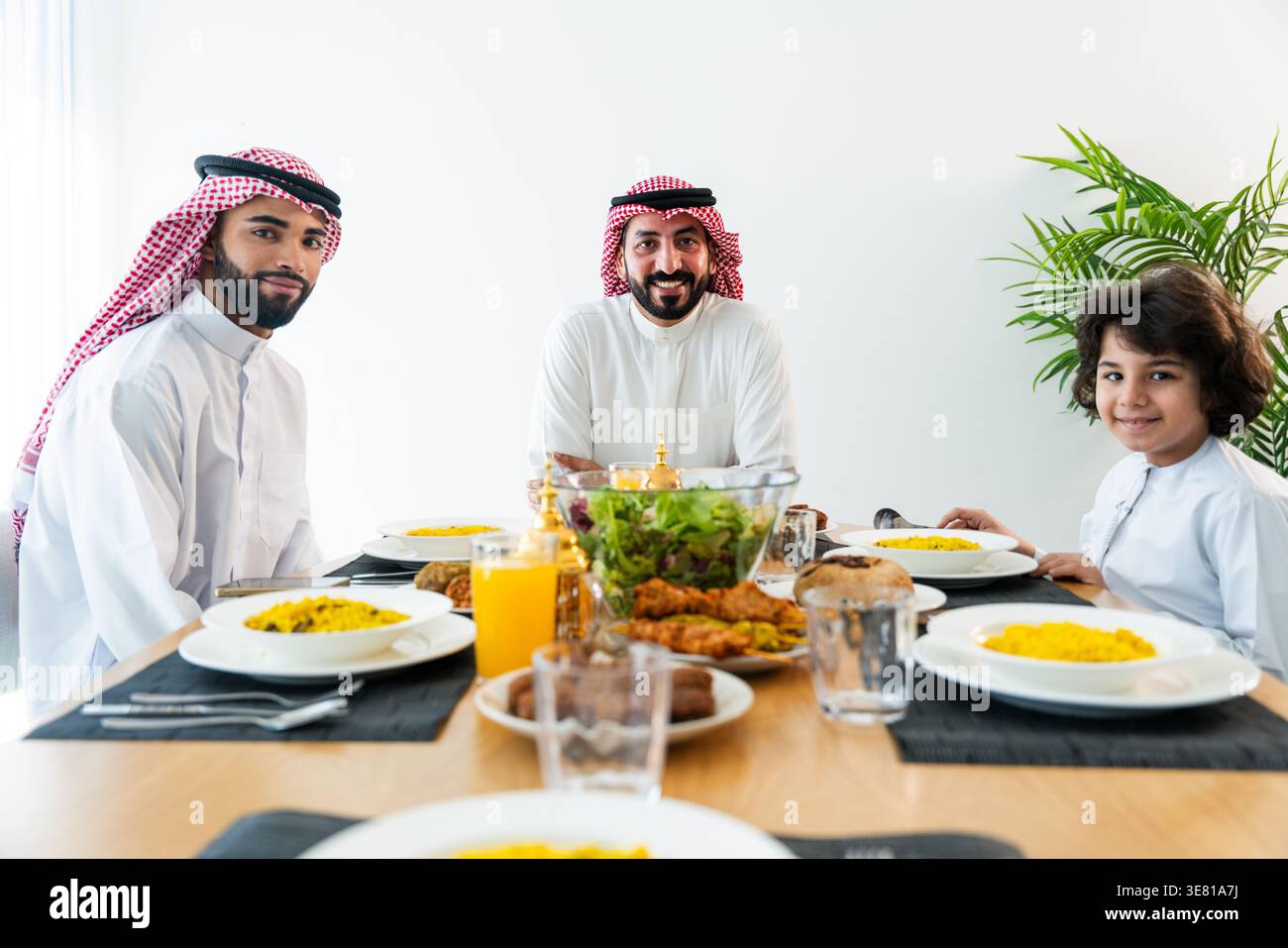Happy Rabai Happy arab family wearing saudi arabia clothing spending time together ...