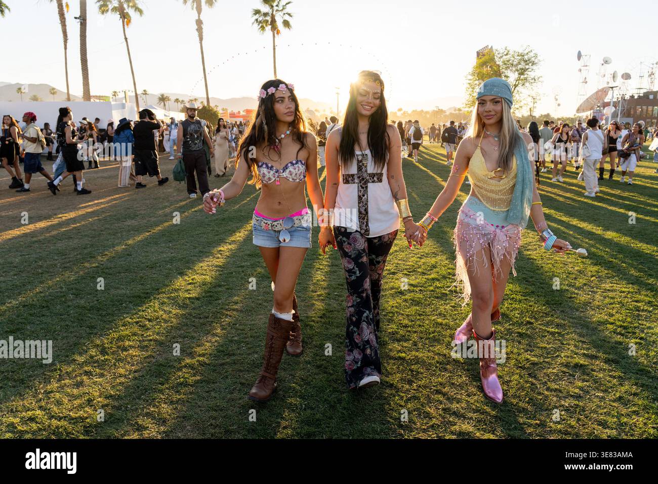 Festivalgoers Aliannah Fernandez, from left, Abrielle Fernandez, and ...