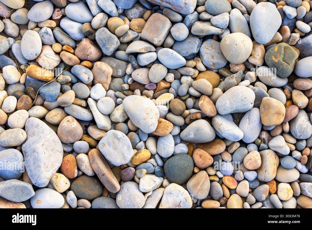 Pebbles on a beach from above Stock Photo