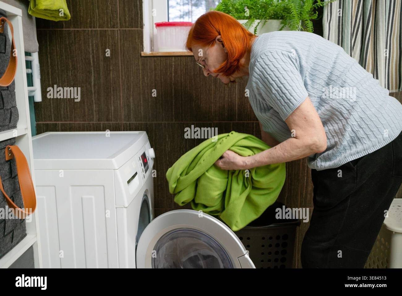 Old woman bent over hi-res stock photography and images - Alamy
