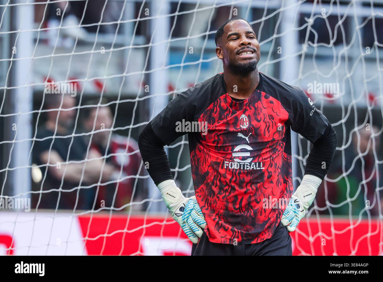 Mike maignan of ac milan reacts during serie a football match between ac milan and udinese calcio at san siro stadium in mila Mike maignan of ac milan reacts during serie a football match between ac milan and udinese calcio at san siro stadium in mila
