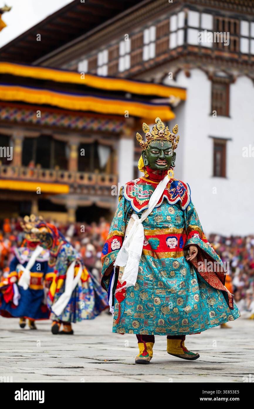 Thimphu Tshechu festival, Bhutan - 04 October 2025: Colorful traditional masked Bhutanese festival dancer. Stock Photo