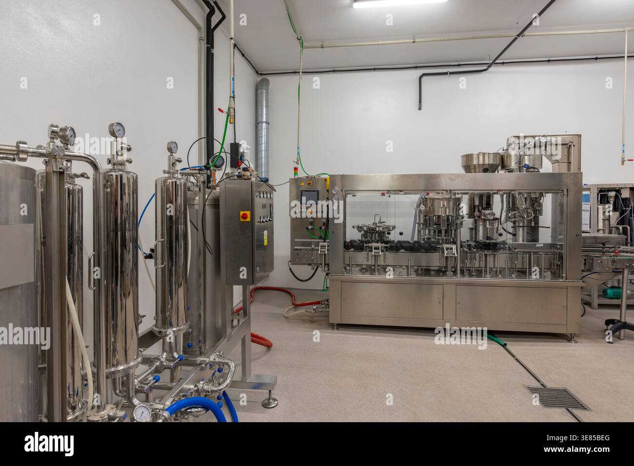 Stainless steel equipment and automated production line in a clean manufacturing facility Stock Photo