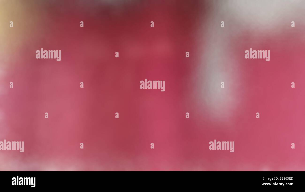 Blurry soft pink, maroon, white gradient creating an abstract background Stock Photo