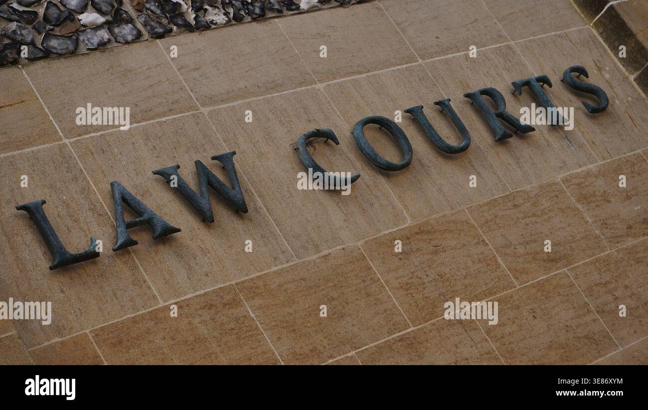 The Law Courts sign outside Winchester Crown Court, UK Stock Photo - Alamy