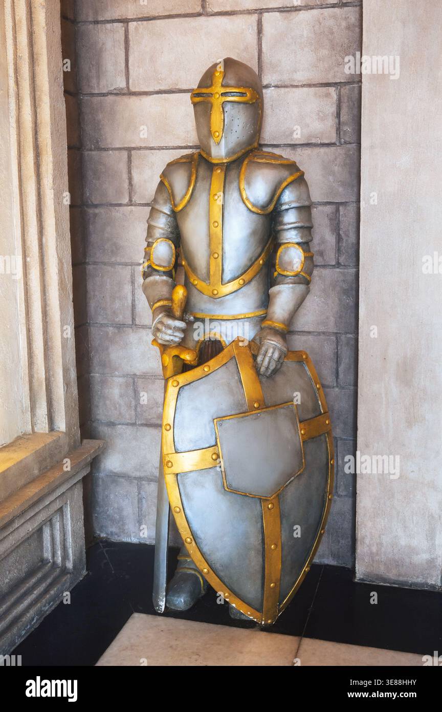 Medieval knight's armor with shield and sword Stock Photo - Alamy