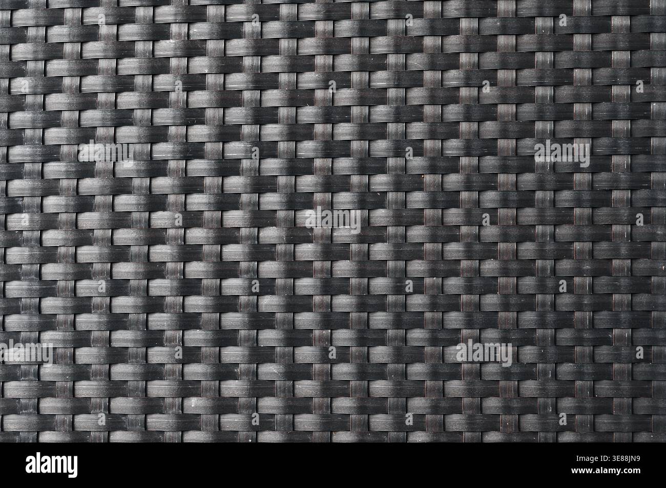 black background with rattan weave texture Stock Photo