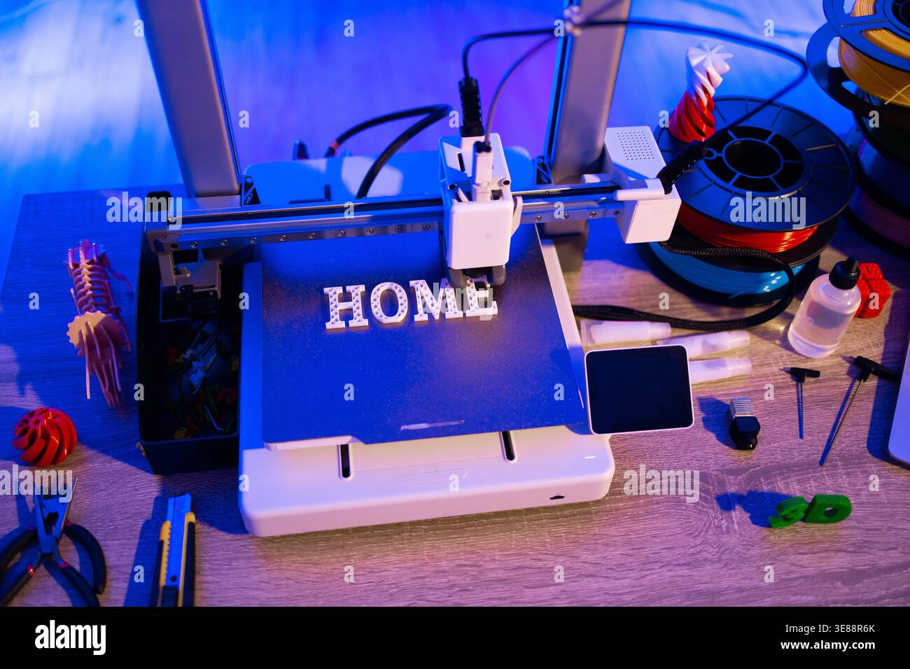 3D Printer Creating HOME Letters Stock Photo