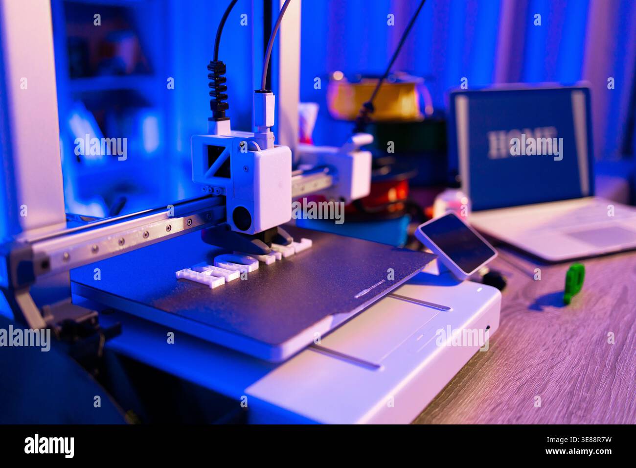 3D Printer Creating Home Letters Stock Photo